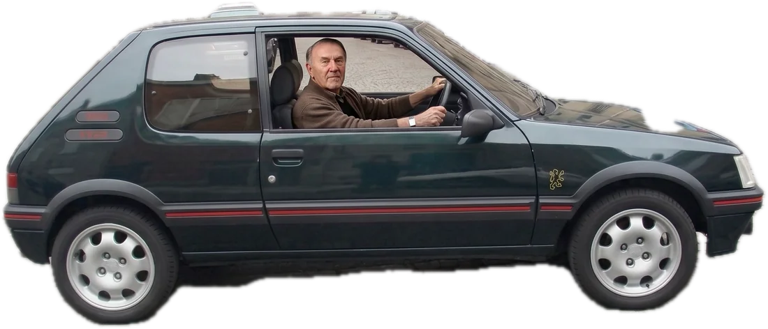 Hubert au volant de sa Peugeot 205